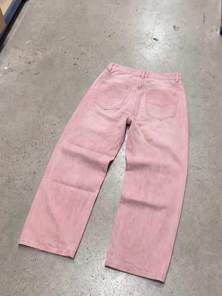 Phone photo: the same jeans turned over, back