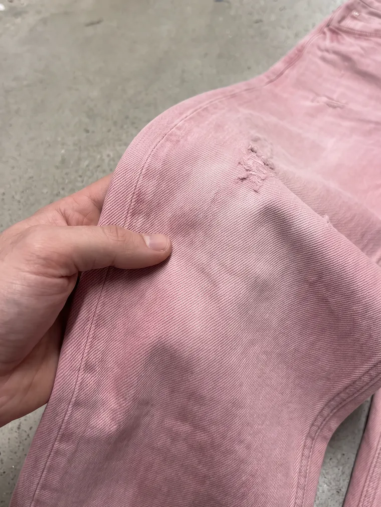 Phone photo: the fabric up close, between two fingers