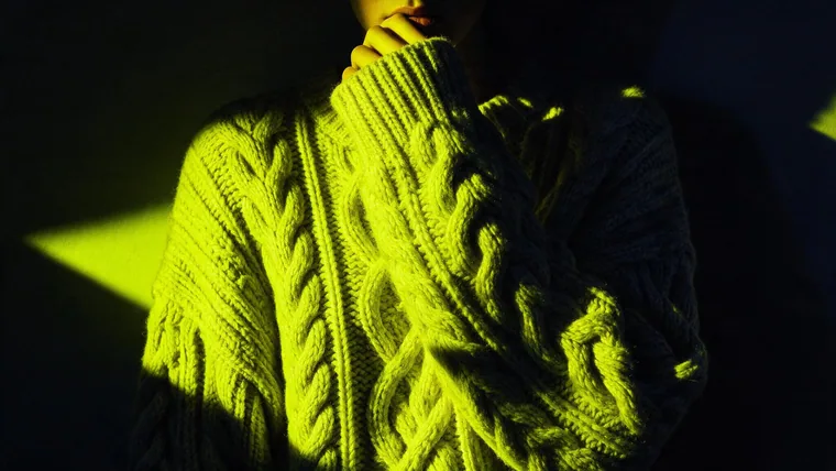 Cable knit up close under raking light